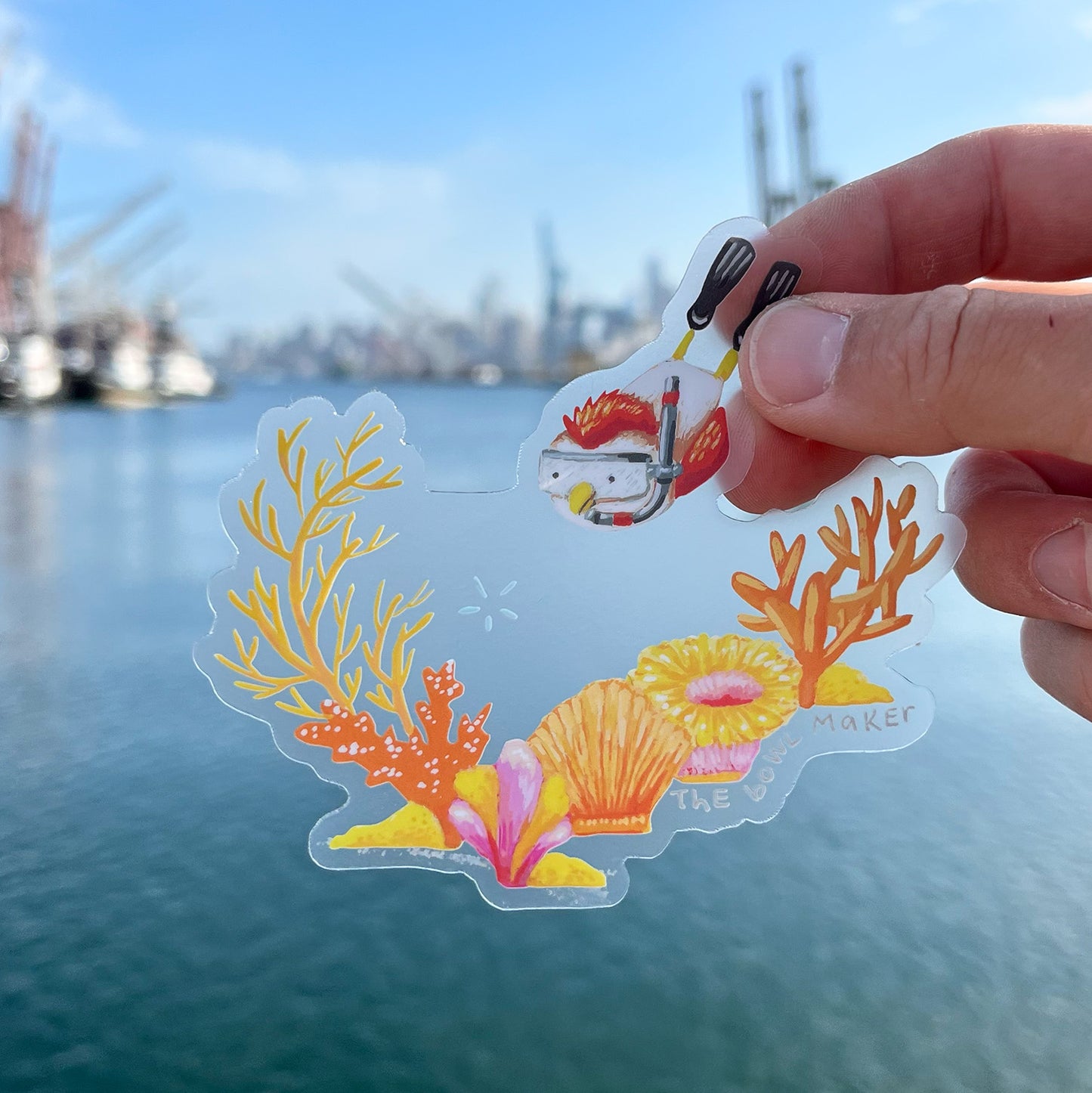 Snorkel Chicken Transparent Sticker in front of the Duwamish River in Seattle